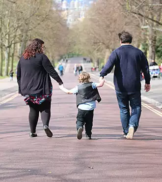Family walking down the road