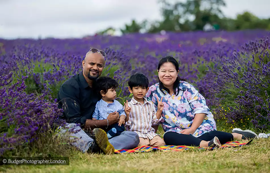 Family seated in a lavender farm