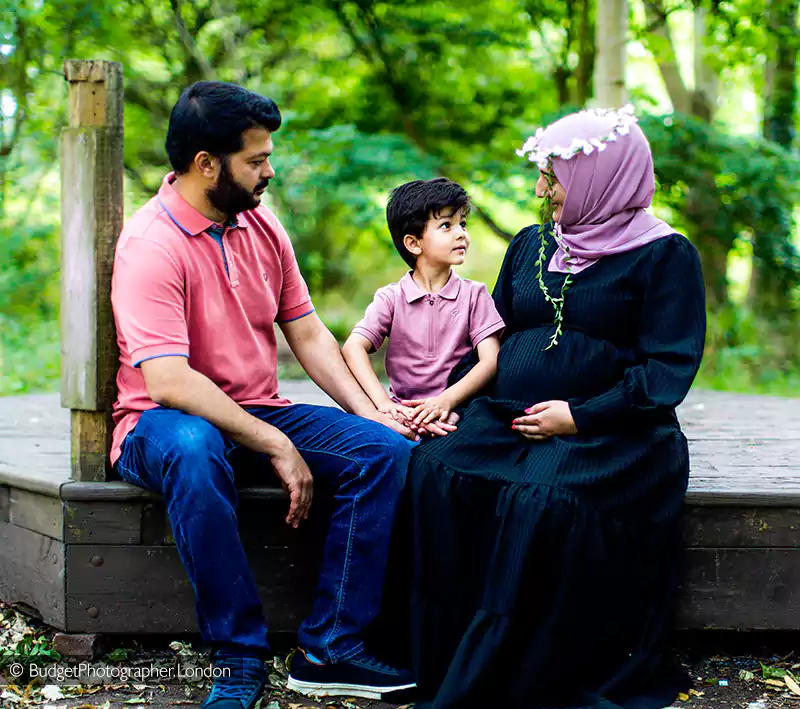 Family seated in a park