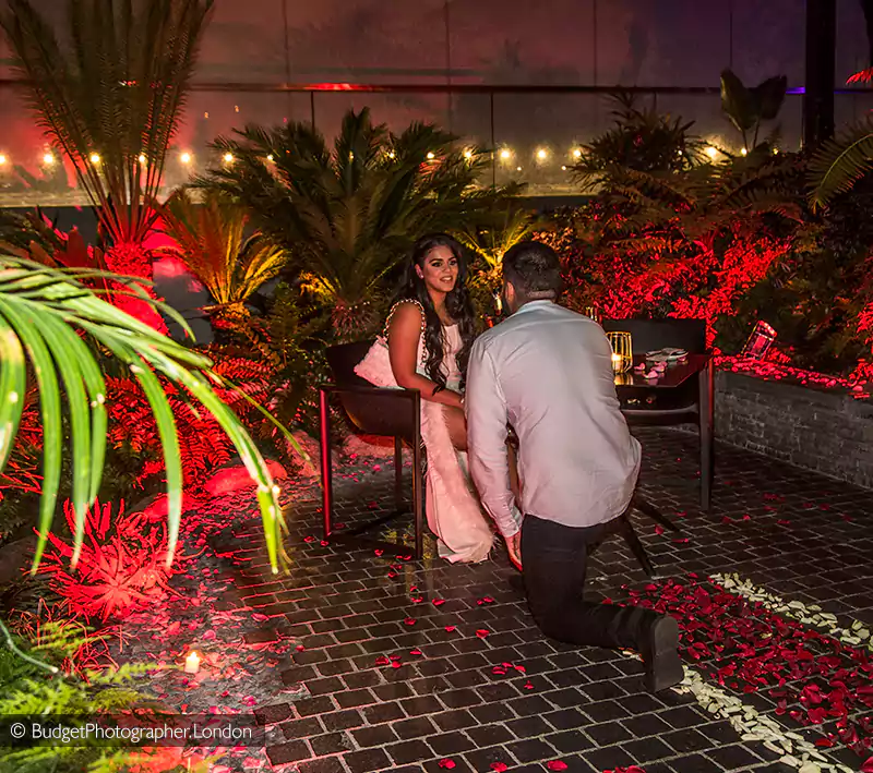 Couple proposing in Sky Garden