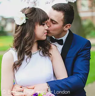 Couple kiss at the Redbridge Registry office