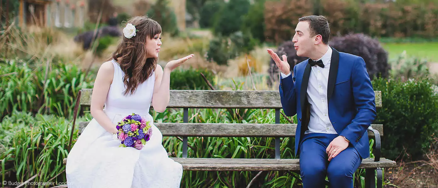 Blowing a kiss in the park at the Redbridge registry office