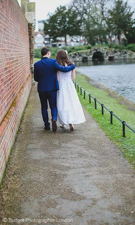 Newly weds walk off hand in hand at Redbridge registry office