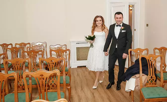 The couple entering the wedding hall